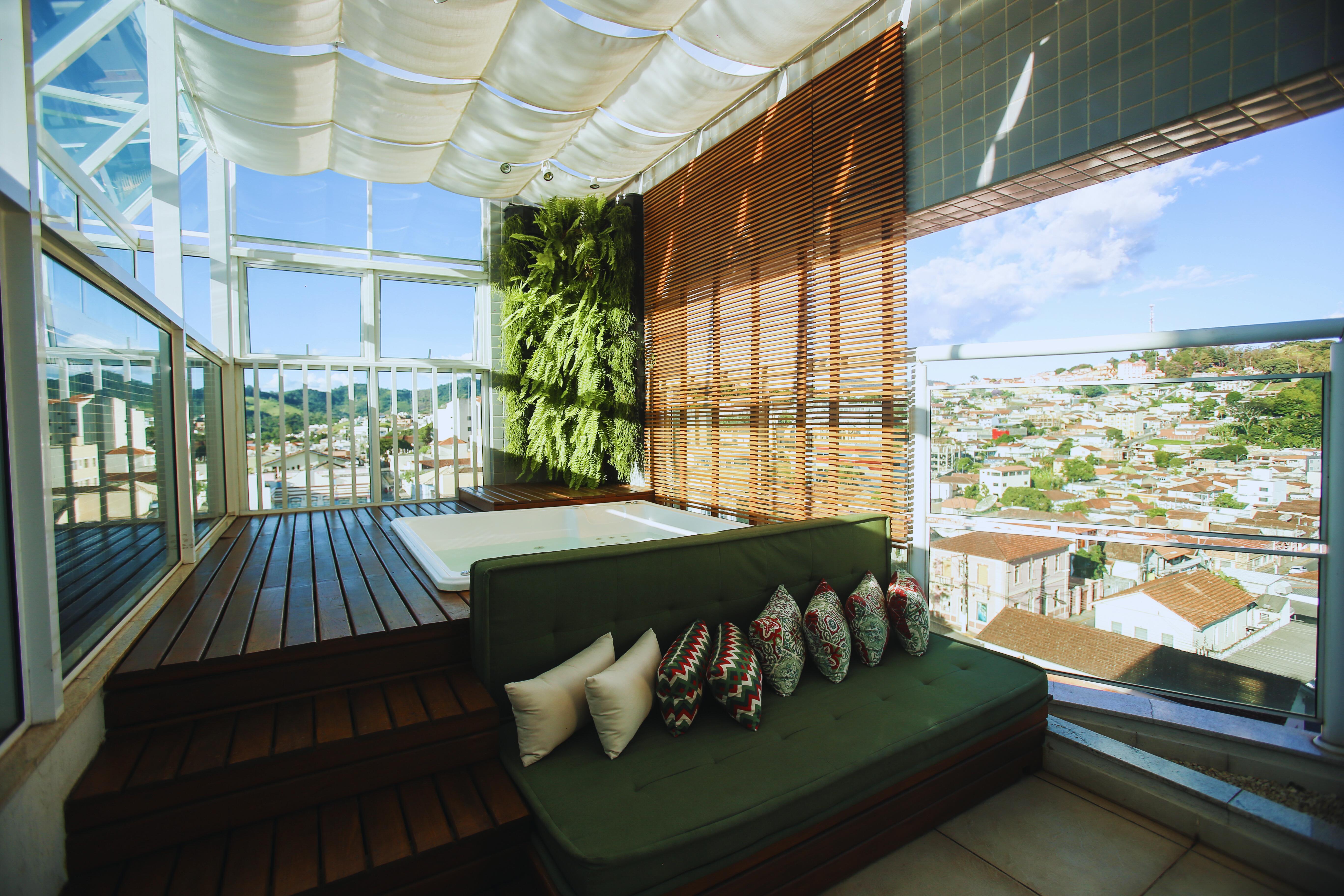 Gontijo Inn Hotel Итажуба Экстерьер фото A rooftop garden in a private home
